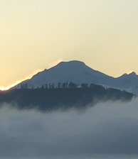 silhouette of mountain during sunset