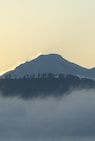 silhouette of mountain during sunset