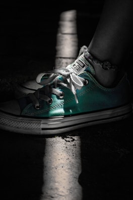 Close-up of flexible, non-deforming ankle braces in action.