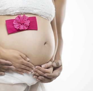 pregnant woman in white skirt