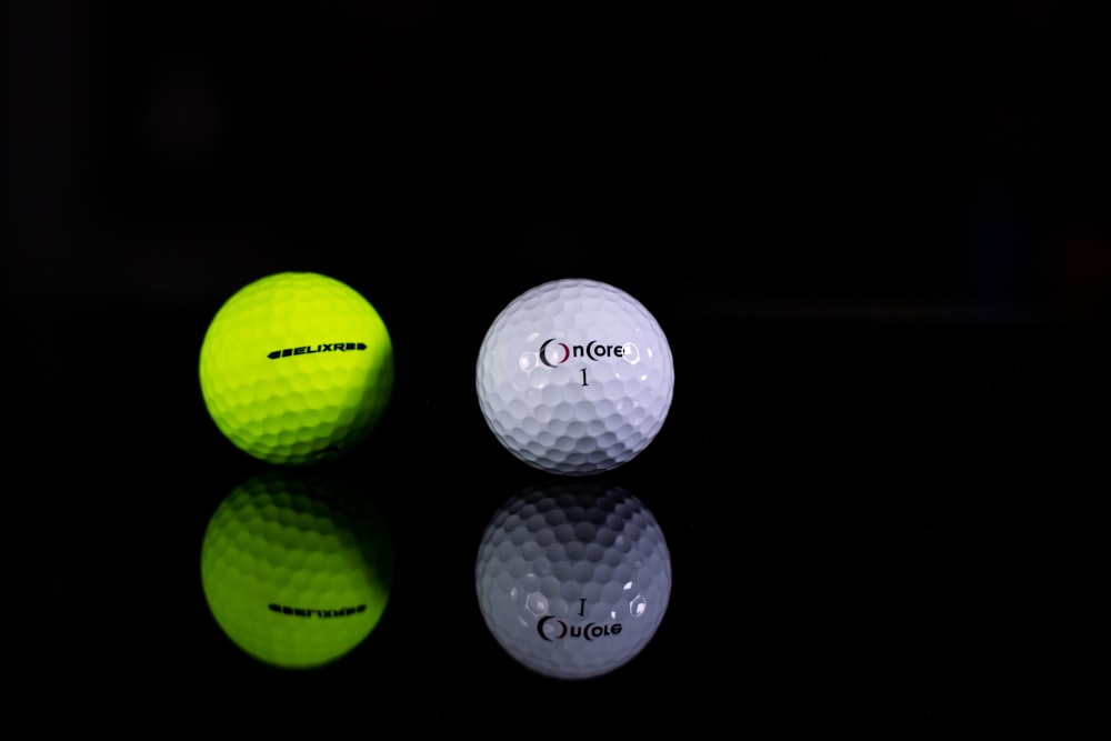 white golf ball in close up photography