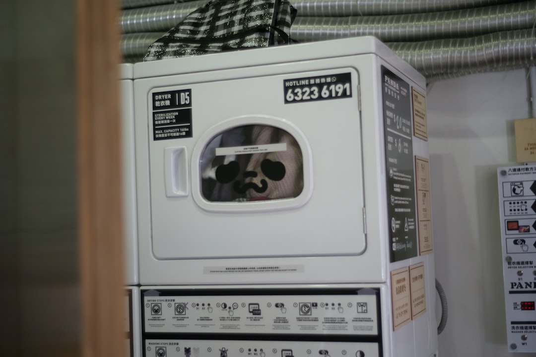 white and gray panasonic microwave oven