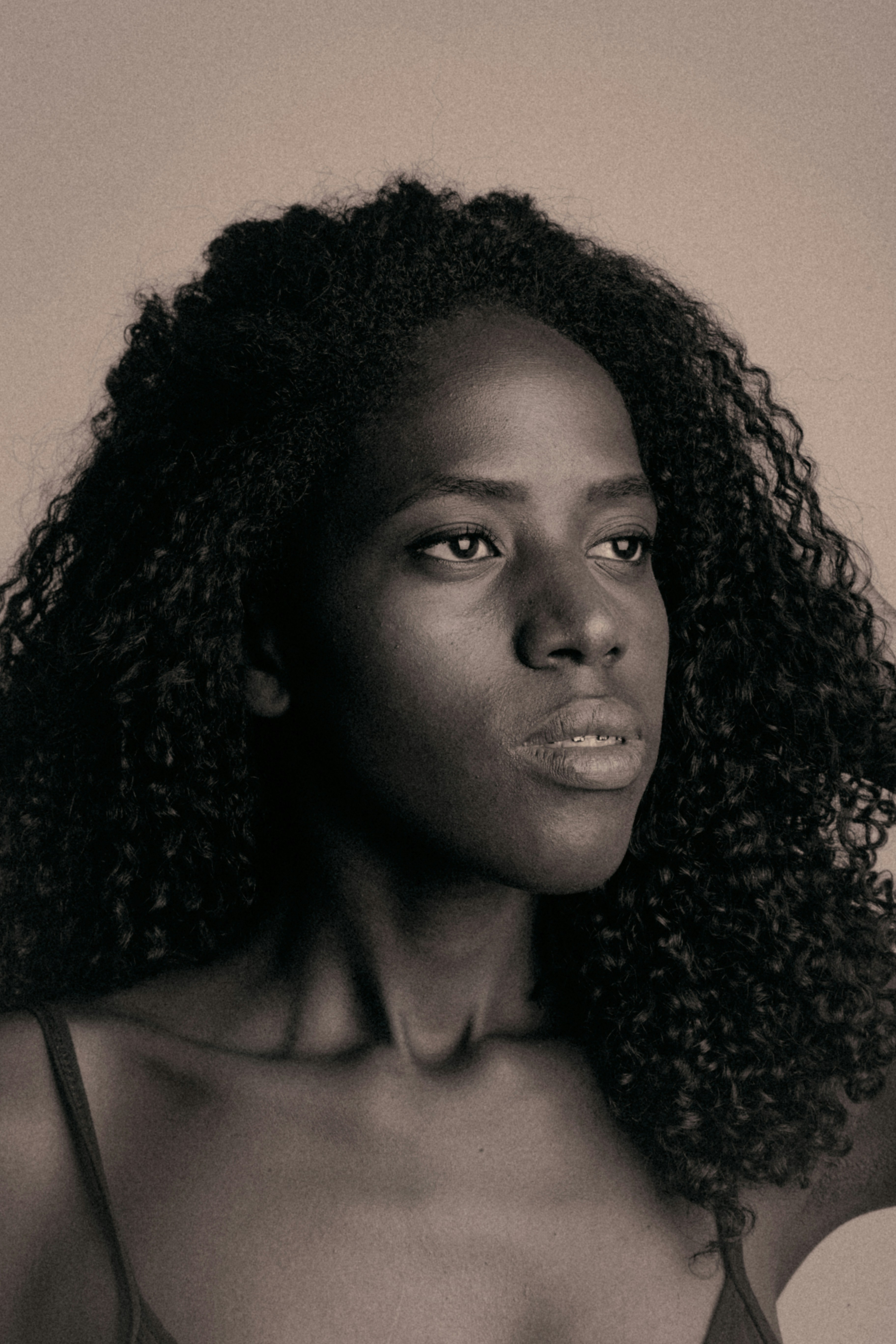 A Keratin treatment on a woman with natural hair