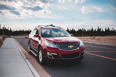 red honda car on road during daytime