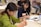 Close-up of hands writing notes during an educational workshop.