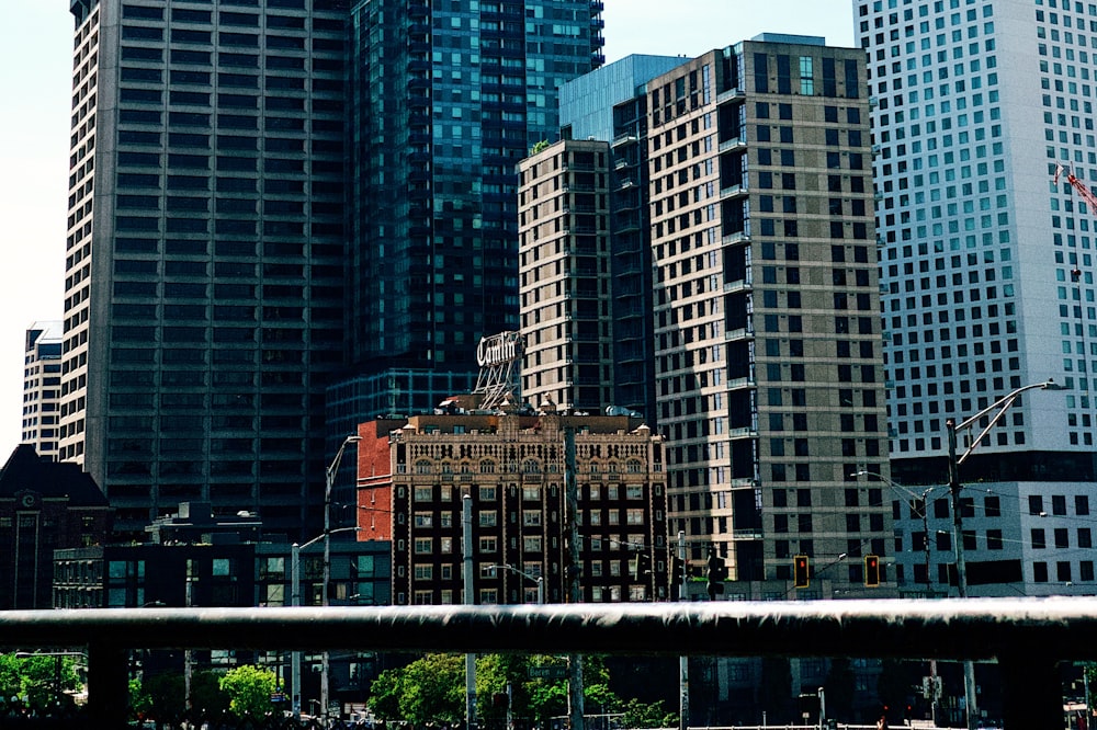 brown concrete building near green trees during daytime