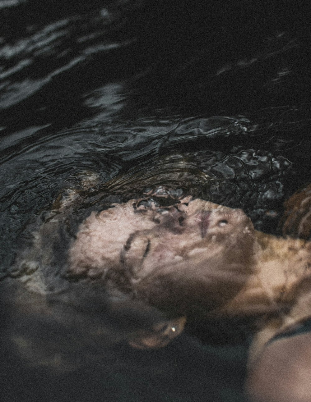 man in water during daytime