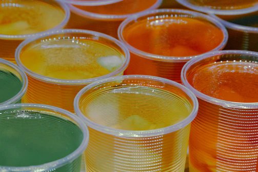 Step-by-step photo of mixing ingredients for a homemade jelly dessert.