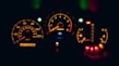 black and yellow analog speedometer