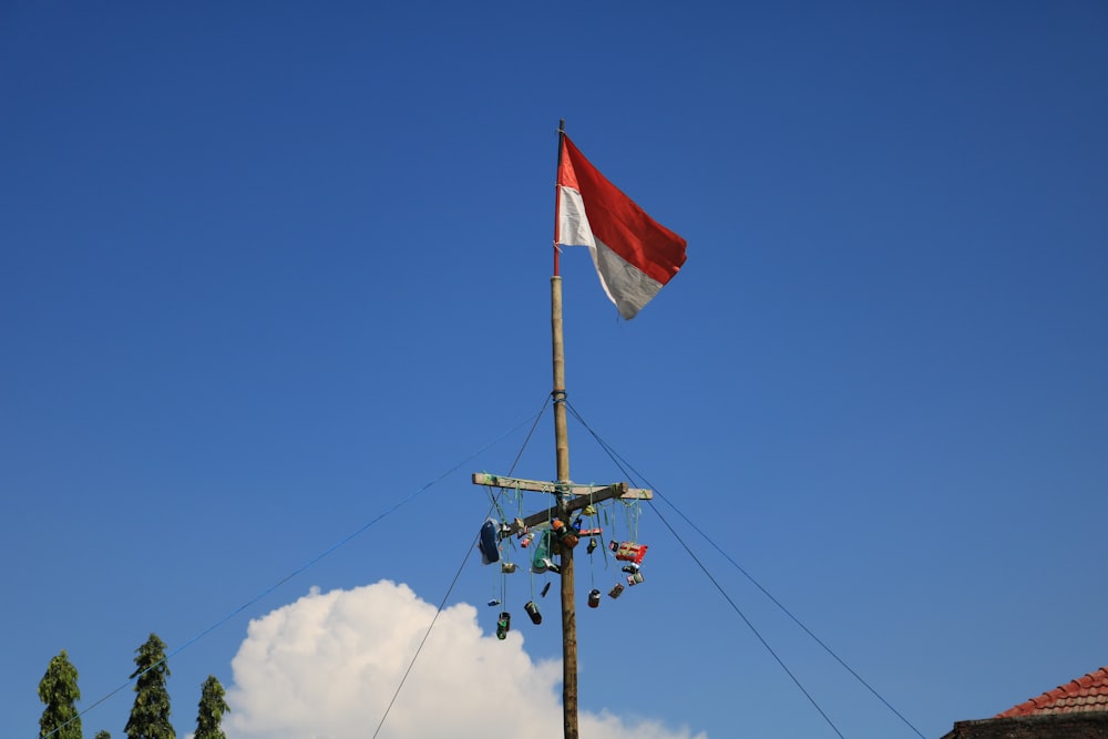 red white and green flag under blue sky during daytime