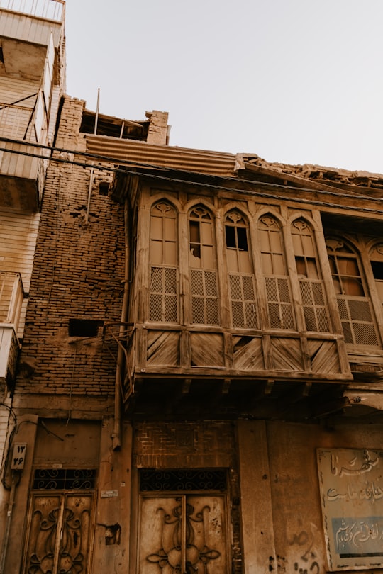 brown concrete building during daytime in Ahvaz Iran