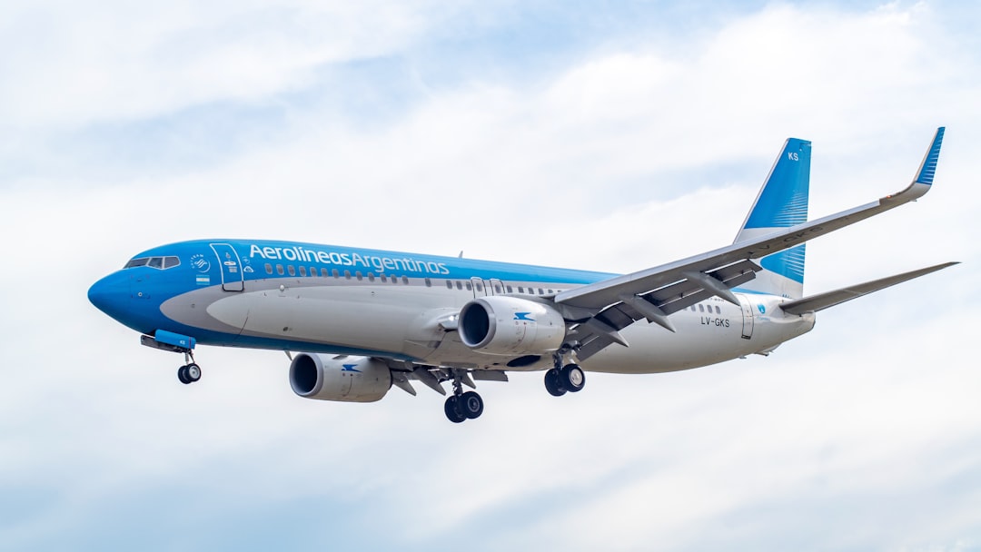blue and white airplane flying during daytime, Aeroparque Metropolitano Jorge Newbery<p></figure>Año 2019