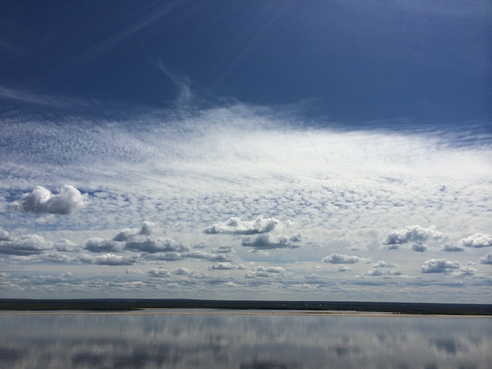 white clouds over the mountain