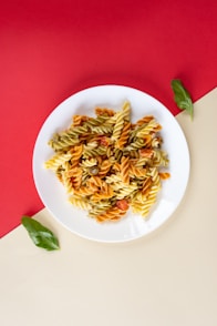white ceramic plate with pasta dish