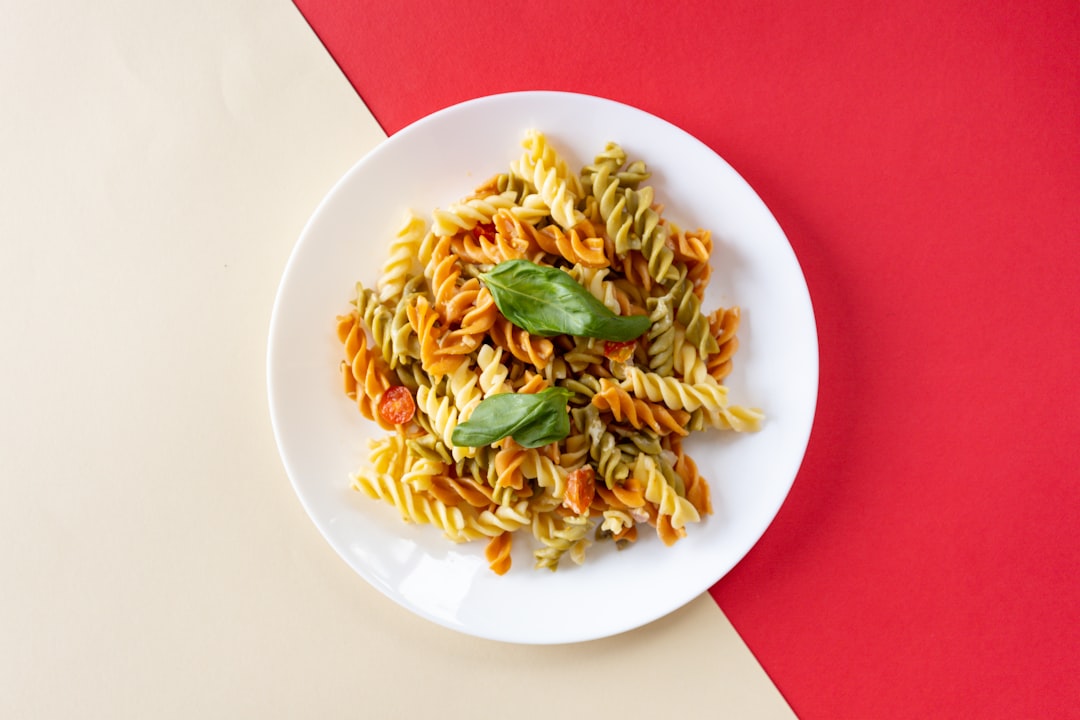 pasta dish on white ceramic plate, Tri-color Pasta Rotini
