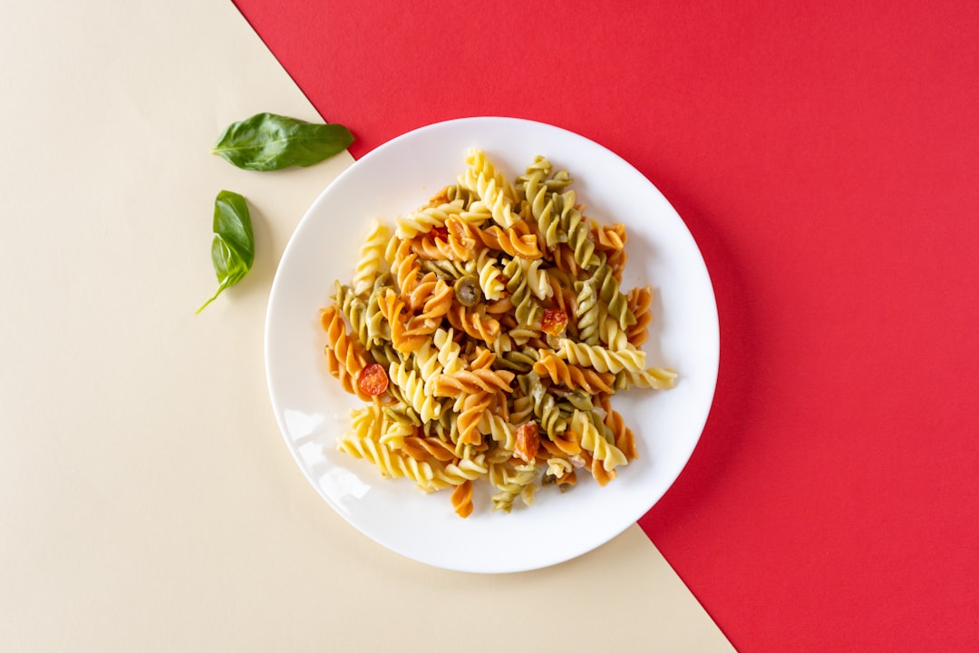 pasta dish on white ceramic plate, Tri-color Pasta Rotini