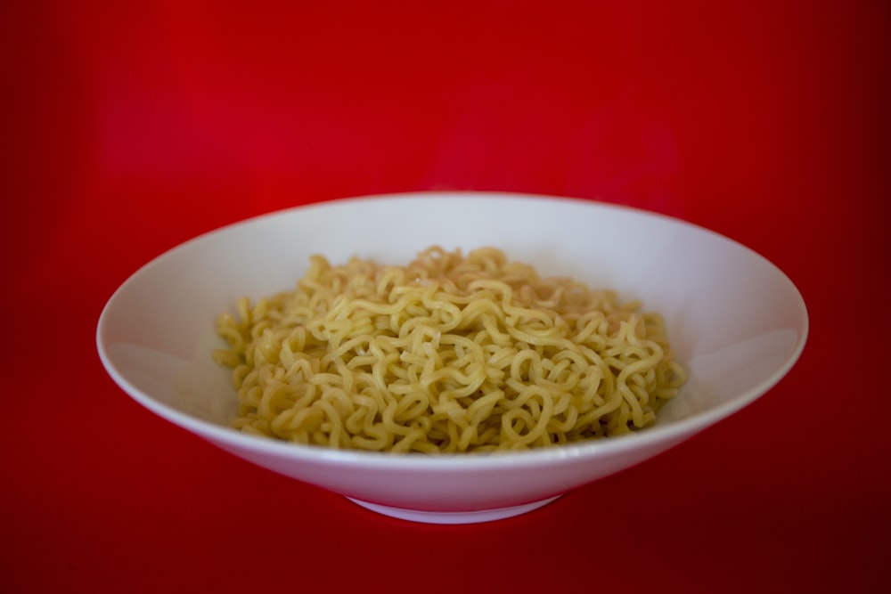 white ceramic bowl with pasta