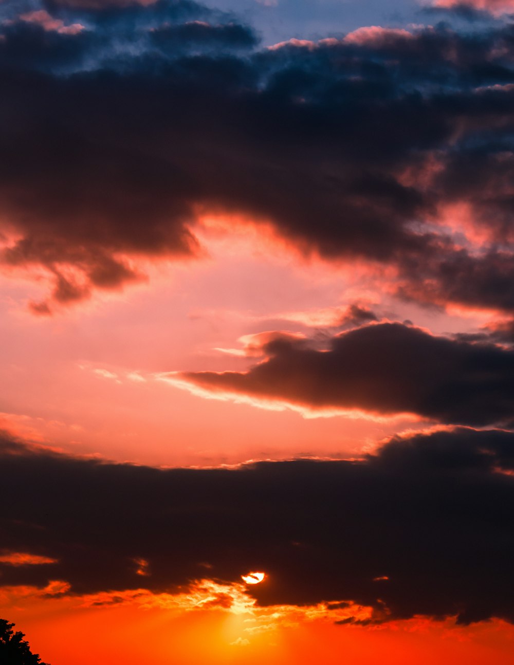 orange and blue cloudy sky during sunset