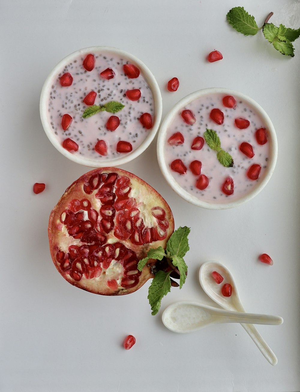 sliced strawberries on white ceramic bowl