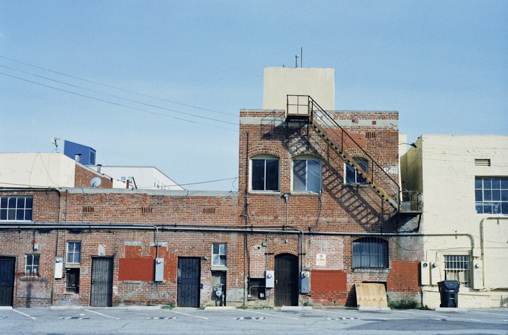 brown concrete building under blue sky during daytime