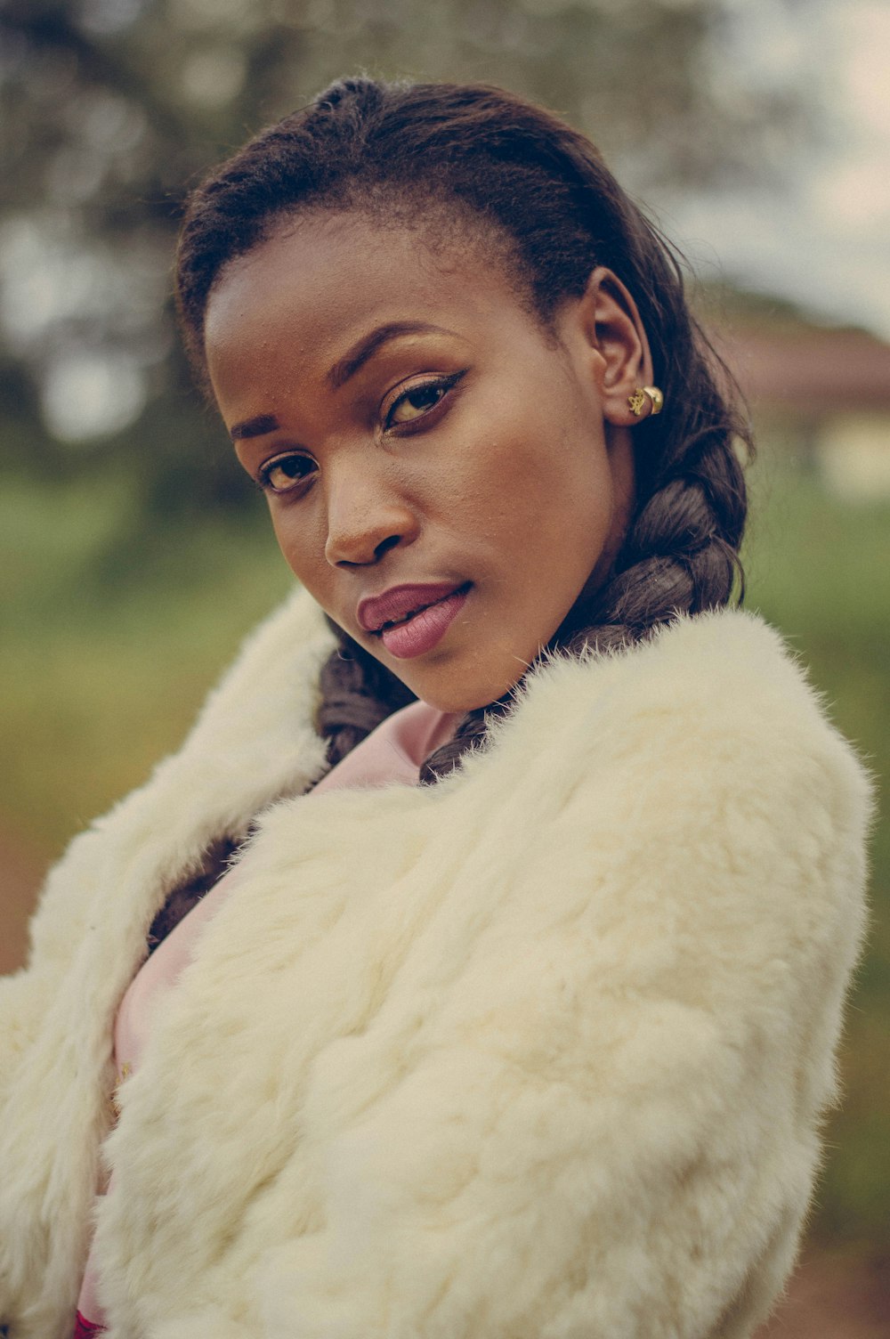 woman in white fur coat