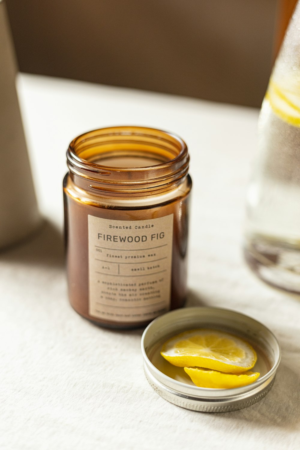 clear glass jar with brown liquid inside