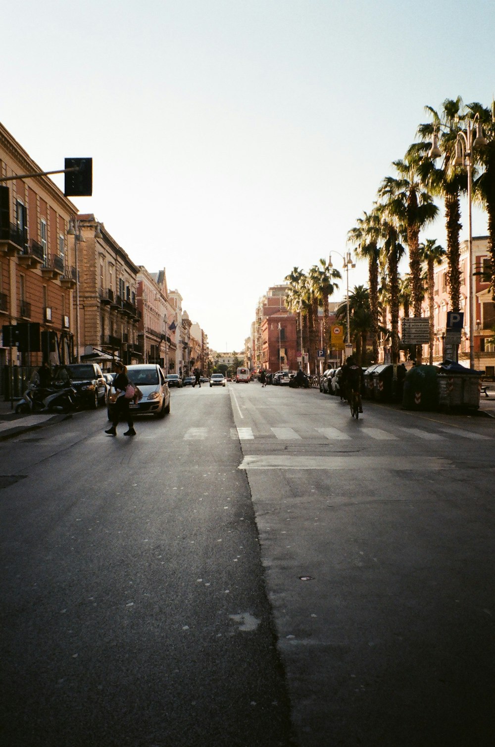 cars parked on side of the road during daytime