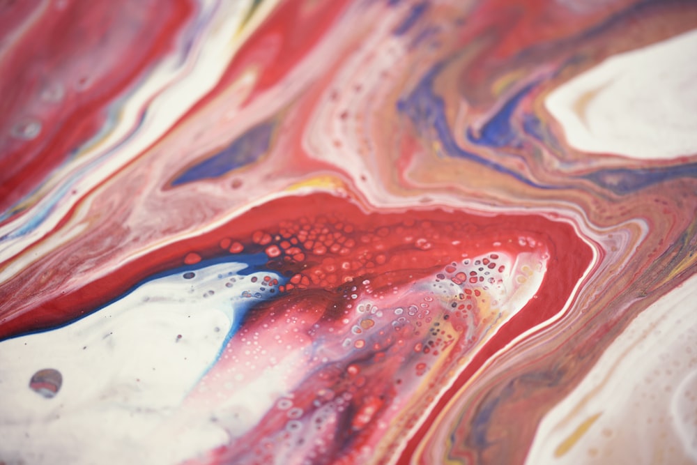 red white and blue abstract painting