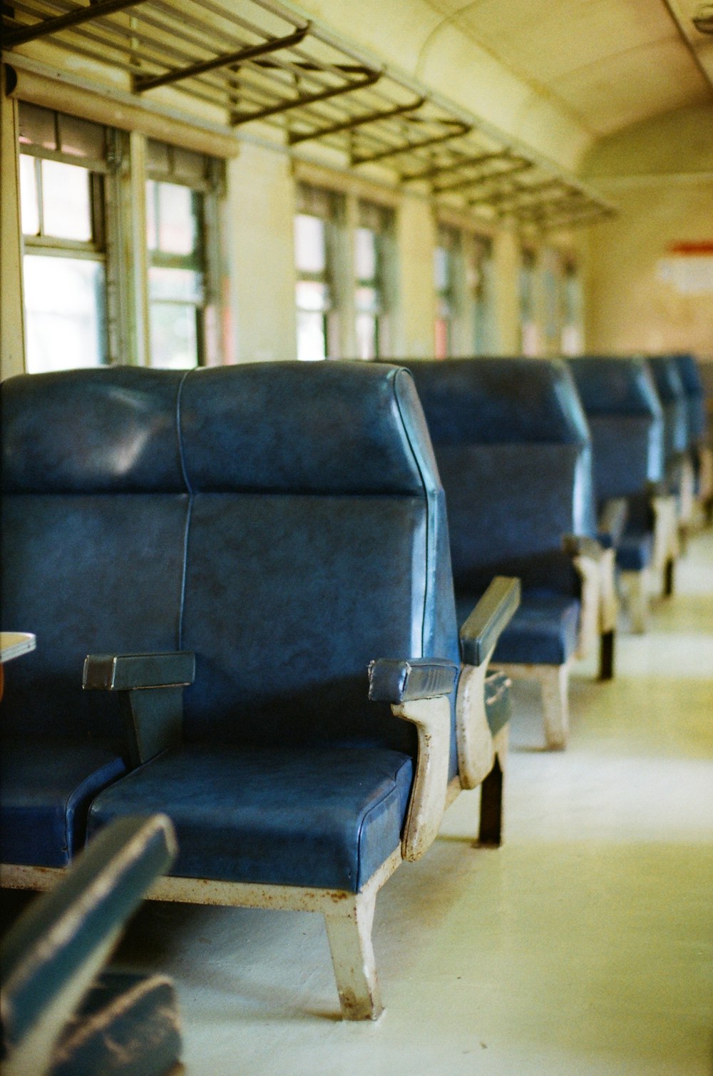 blue and gray padded chair