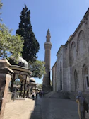 A peaceful moment at a historic mosque with intricate architecture.