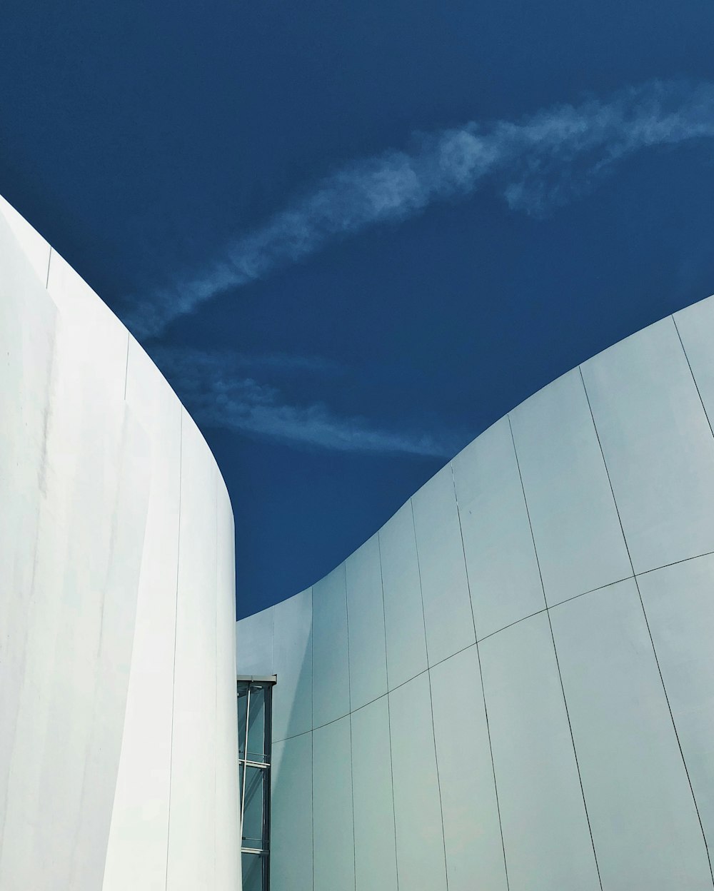 white concrete building under blue sky during daytime