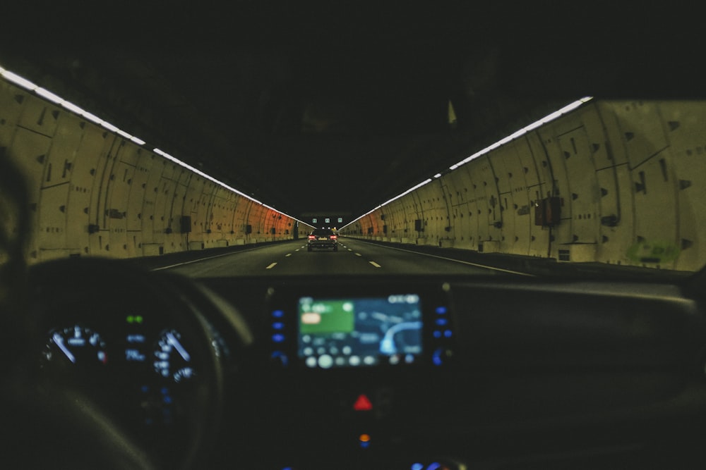 black and white tunnel with lights