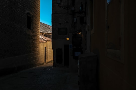 brown brick building during daytime in Segovia Spain