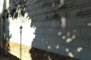 white string lights on gray concrete wall
