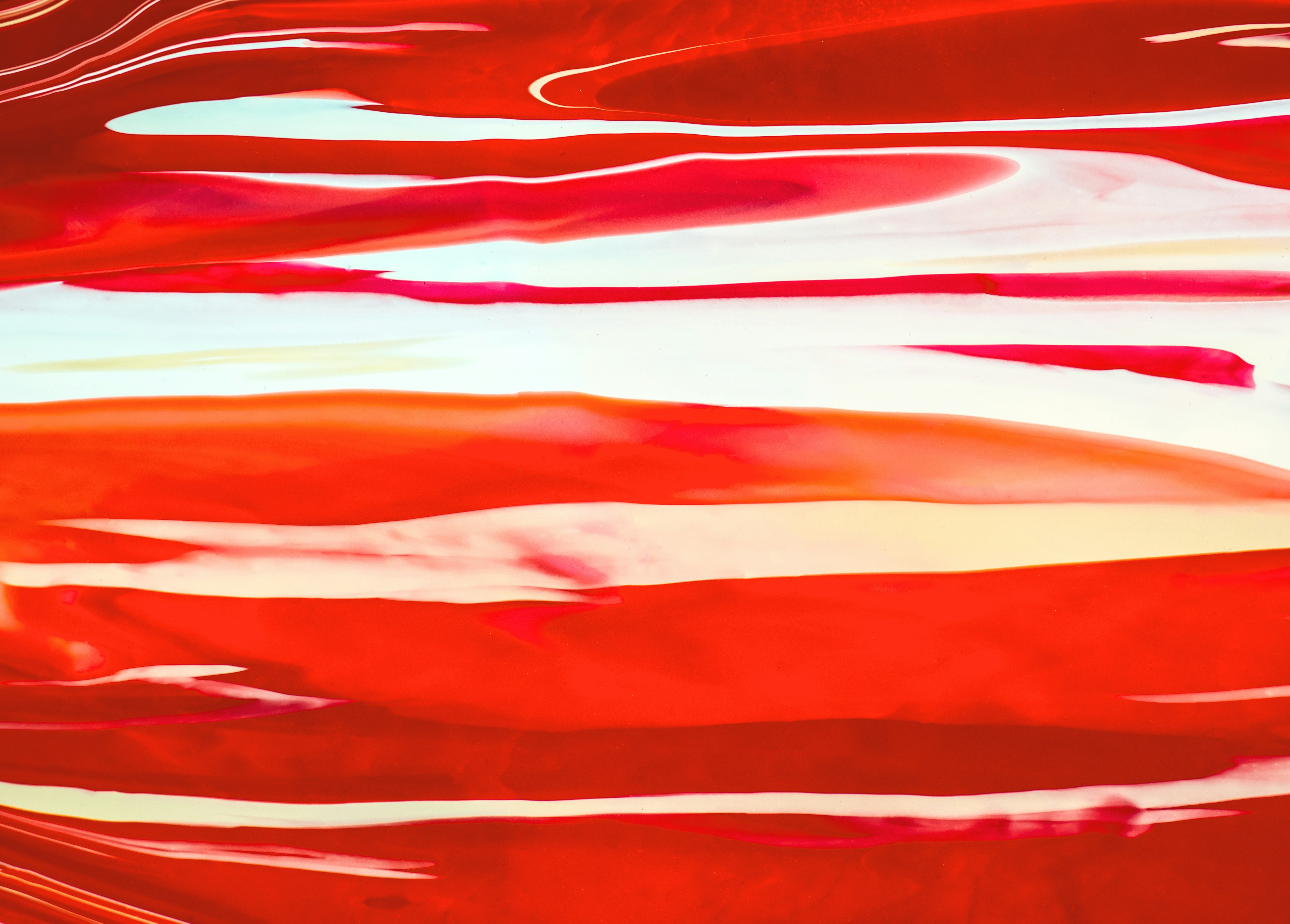 red and white striped textile