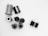 A collection of film canisters and film rolls arranged on a plain white background. The image includes several black and grey cylindrical canisters and rolls of film, some with visible film strips.