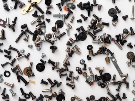 silver and gold coloured screws