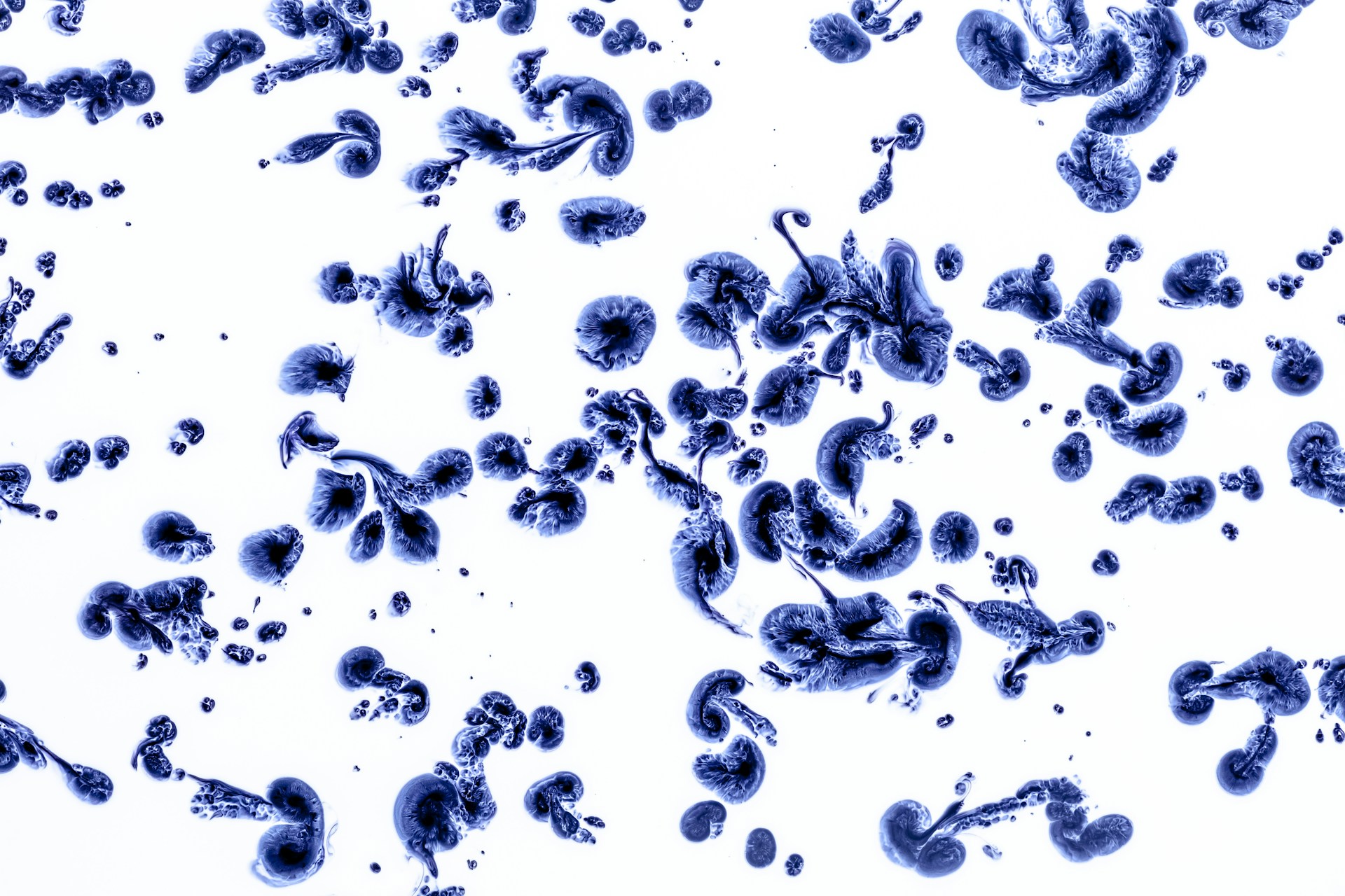 woman wearing yellow long-sleeved dress under white clouds and blue sky during daytime