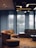 A beautifully designed living room featuring modern furniture and soft lighting.
