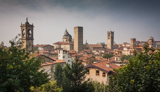 white and brown concrete building in Bergamo Italy