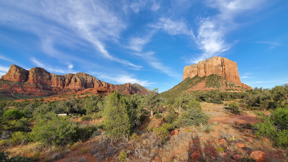 brown rocky mountain under blue sky during daytime