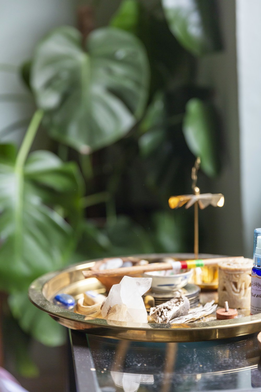 brown and white cigarette butts on blue round ashtray