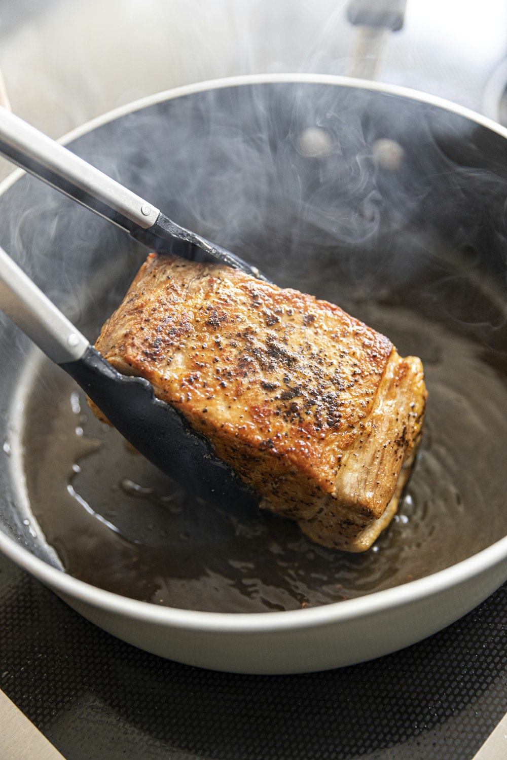 bread on black ceramic plate