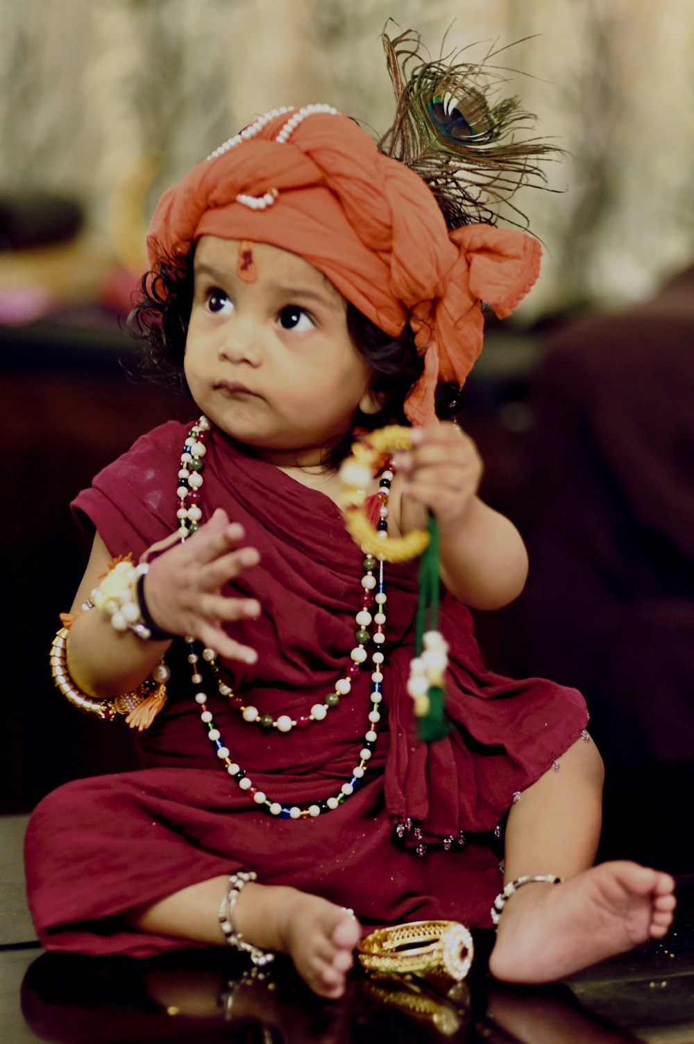 girl in red dress with orange head band