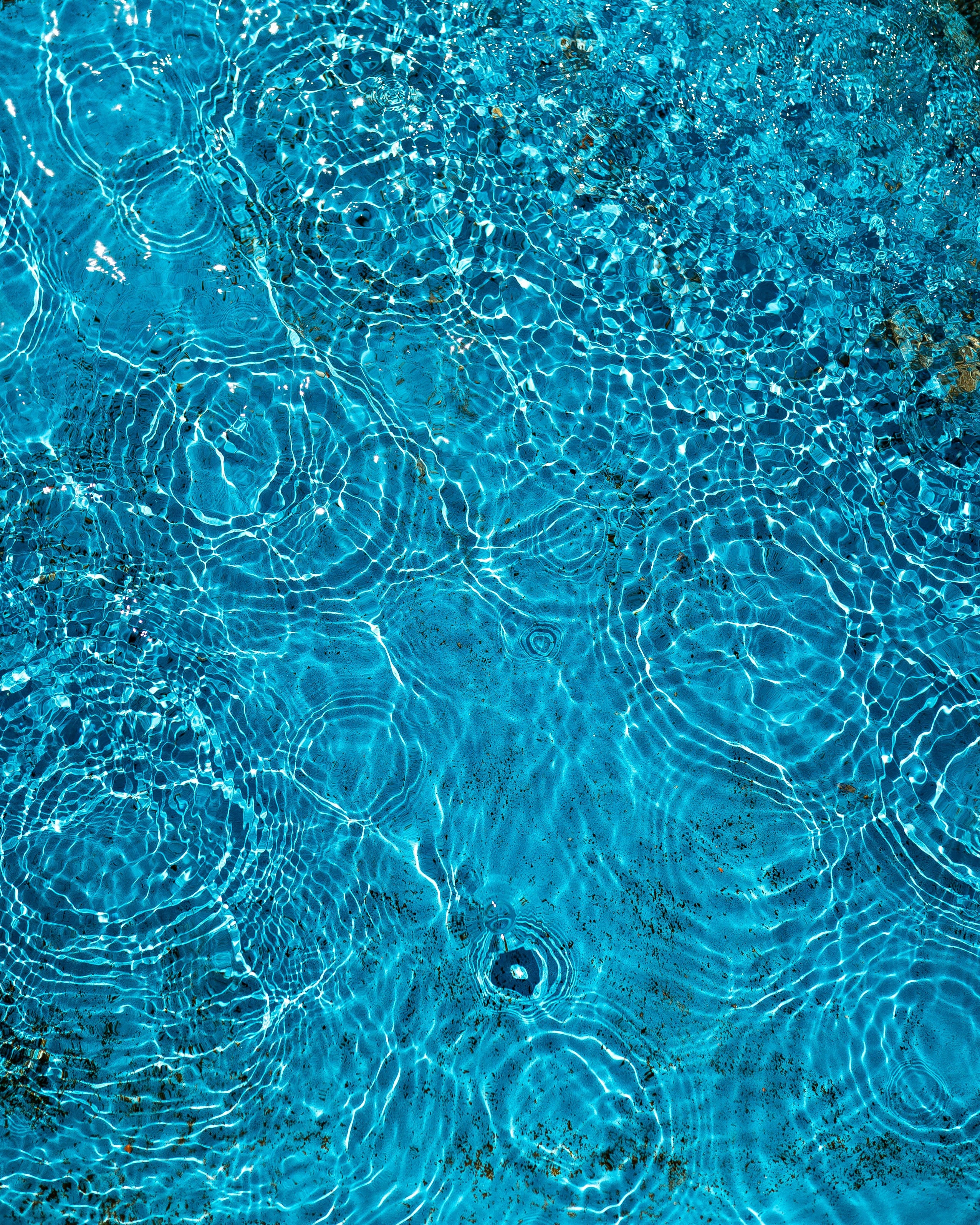 blue water with white bubbles