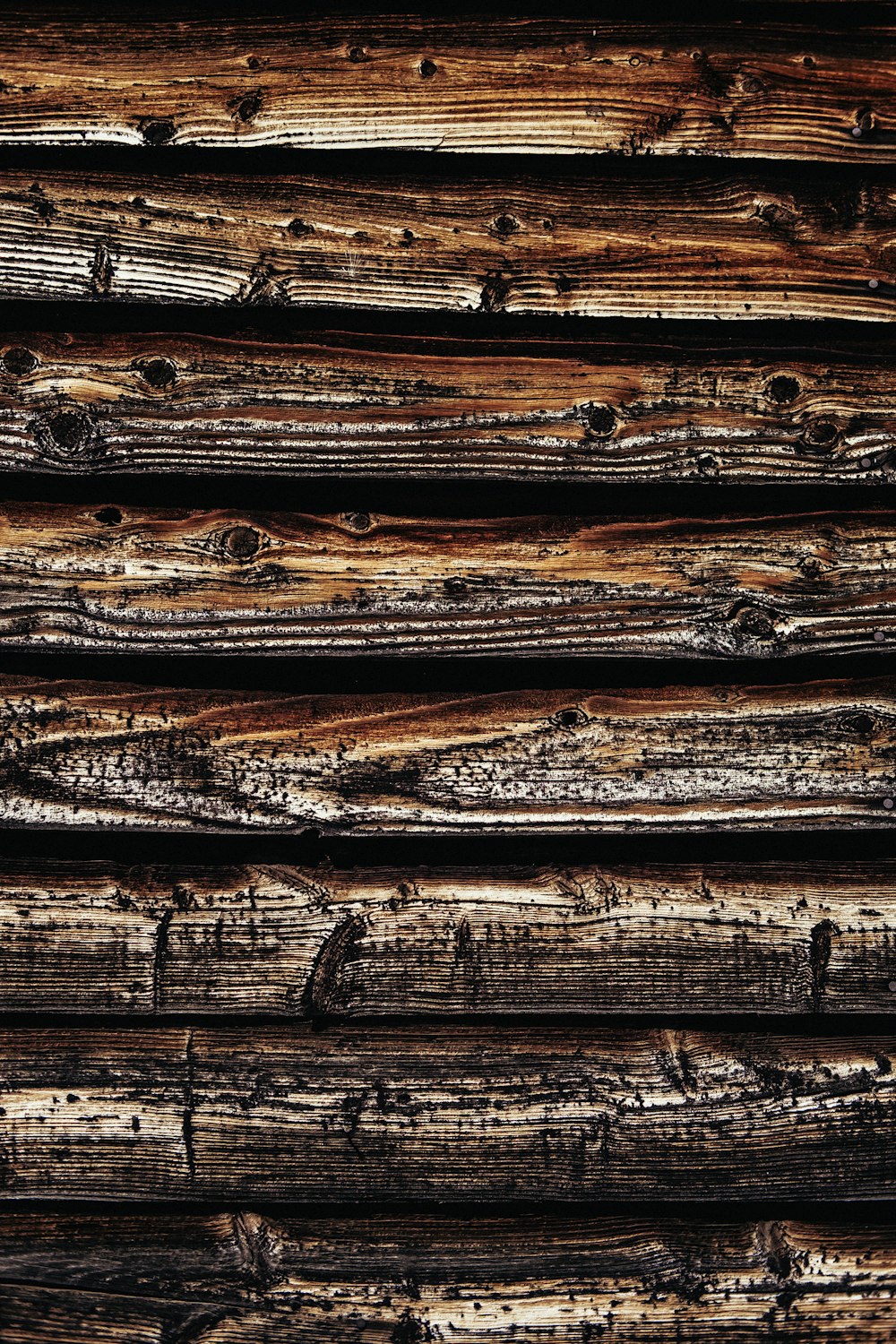 brown and black wooden surface