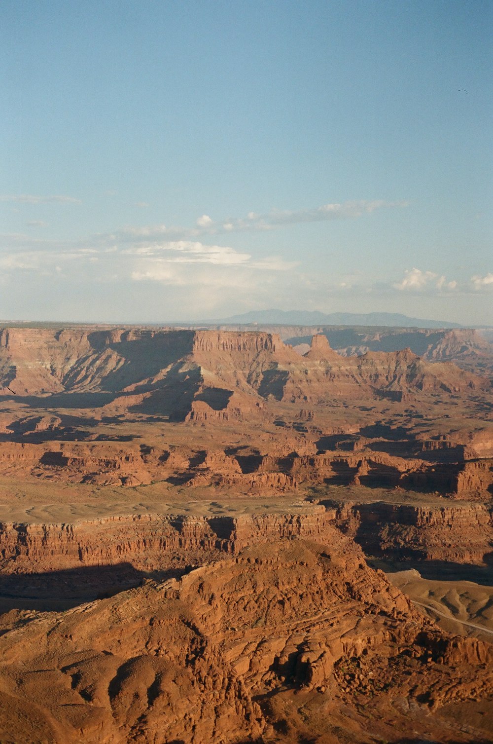 brown rock formation under blue sky during daytime