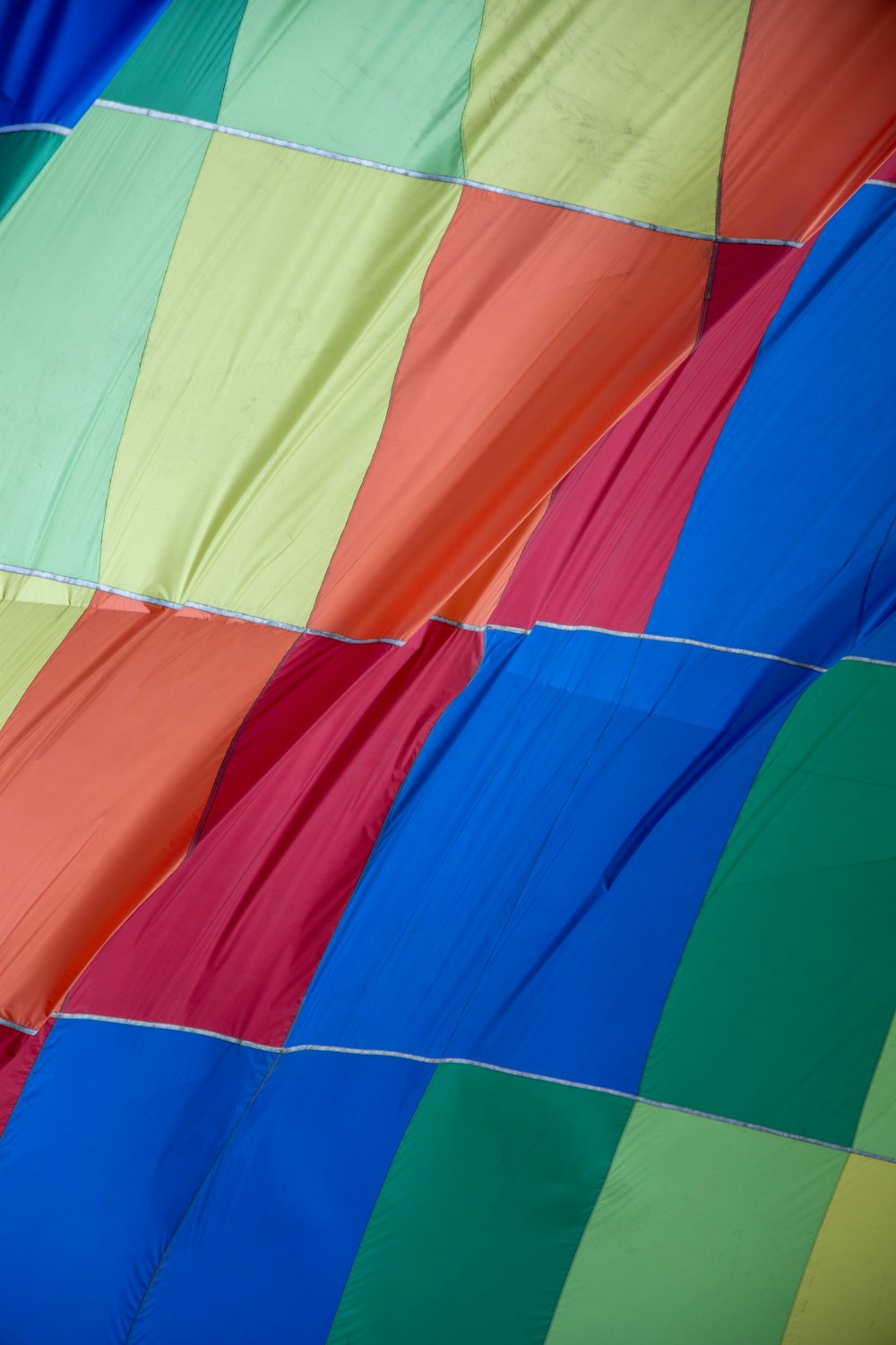 multi colored striped textile on white background