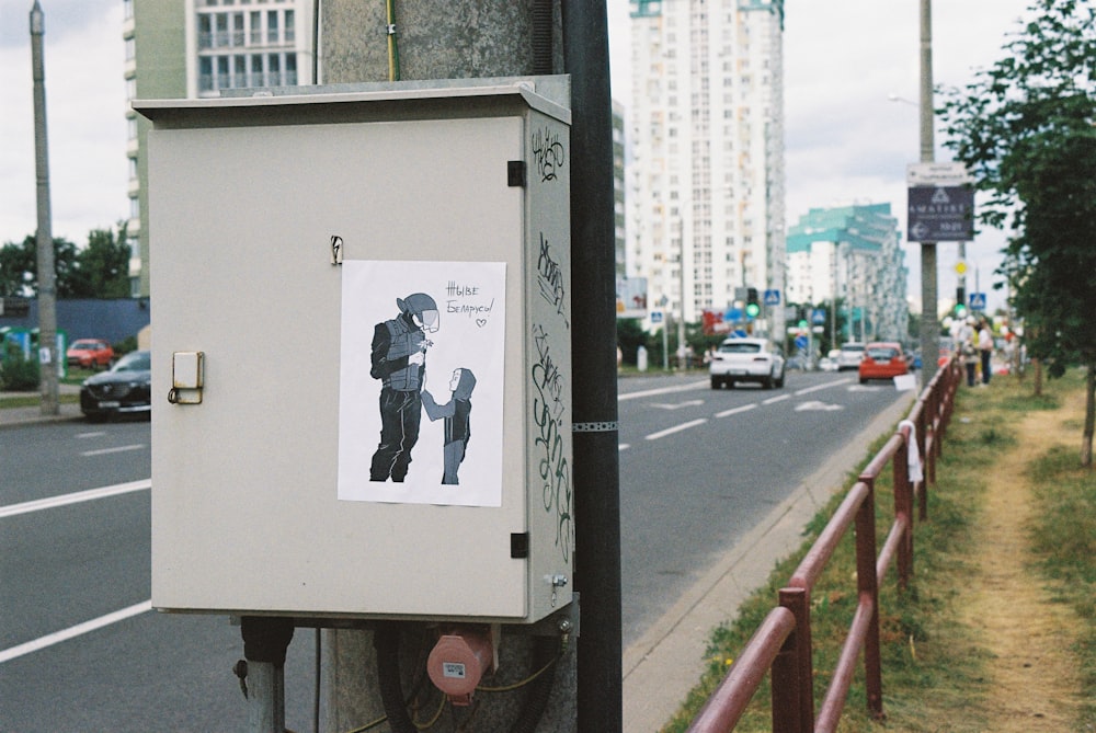 white and black box on road