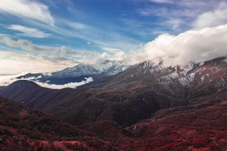 Panoramic view of an iconic Latin American mountain landscape under dramatic skies.